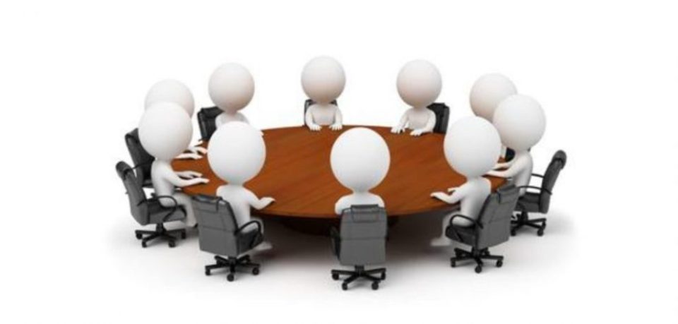 Disegno figure stilizzate persone attorno a un tavolo